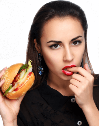 ハンバーガー食べる女性